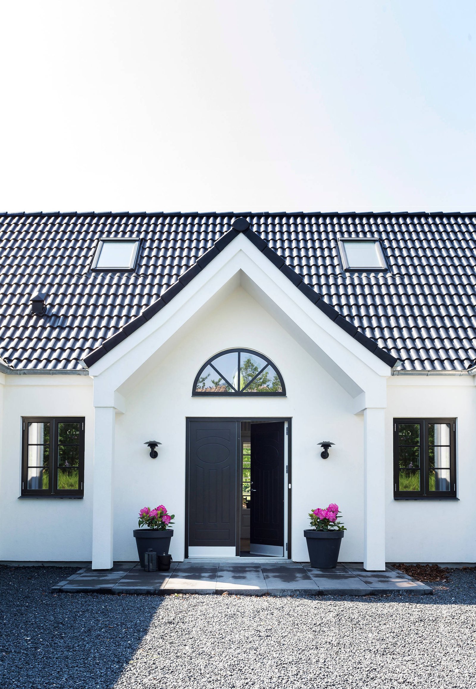 Classic modern Danish residence exterior with clean lines and warm wood accents