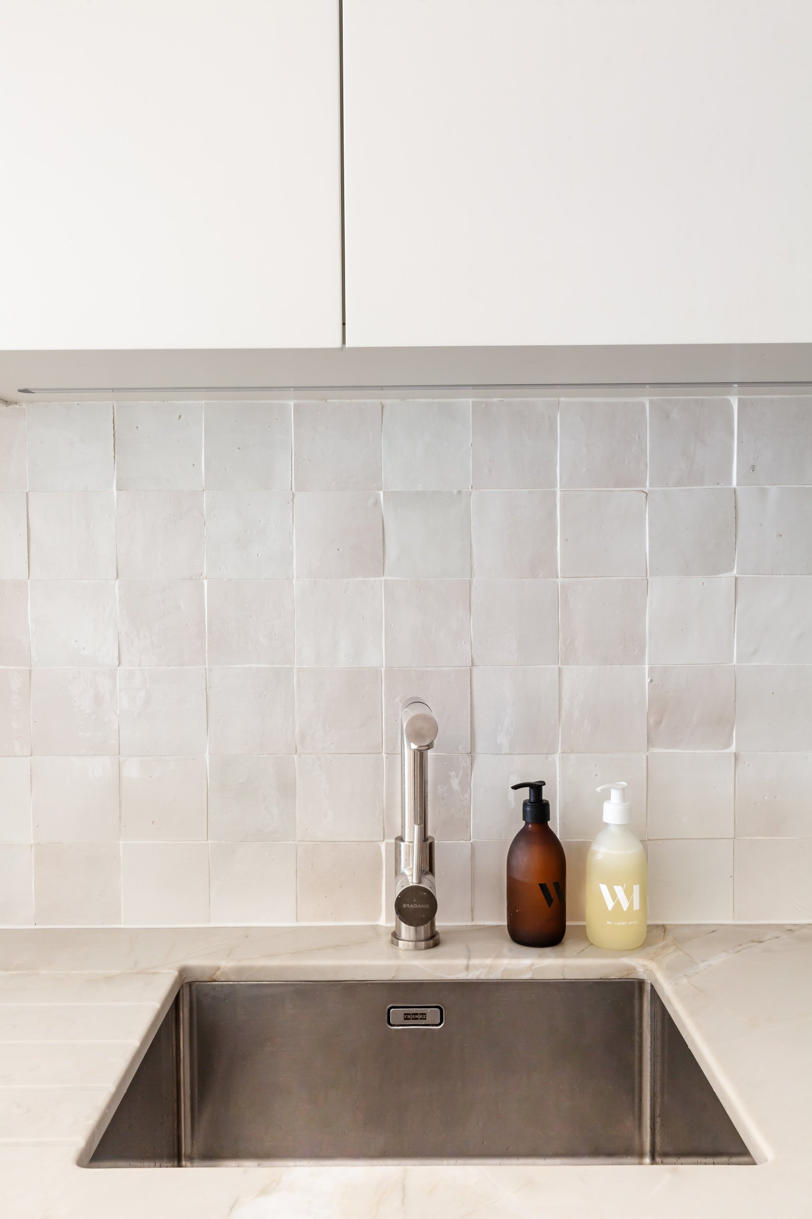 Master bathroom vanity with backlit LED mirror