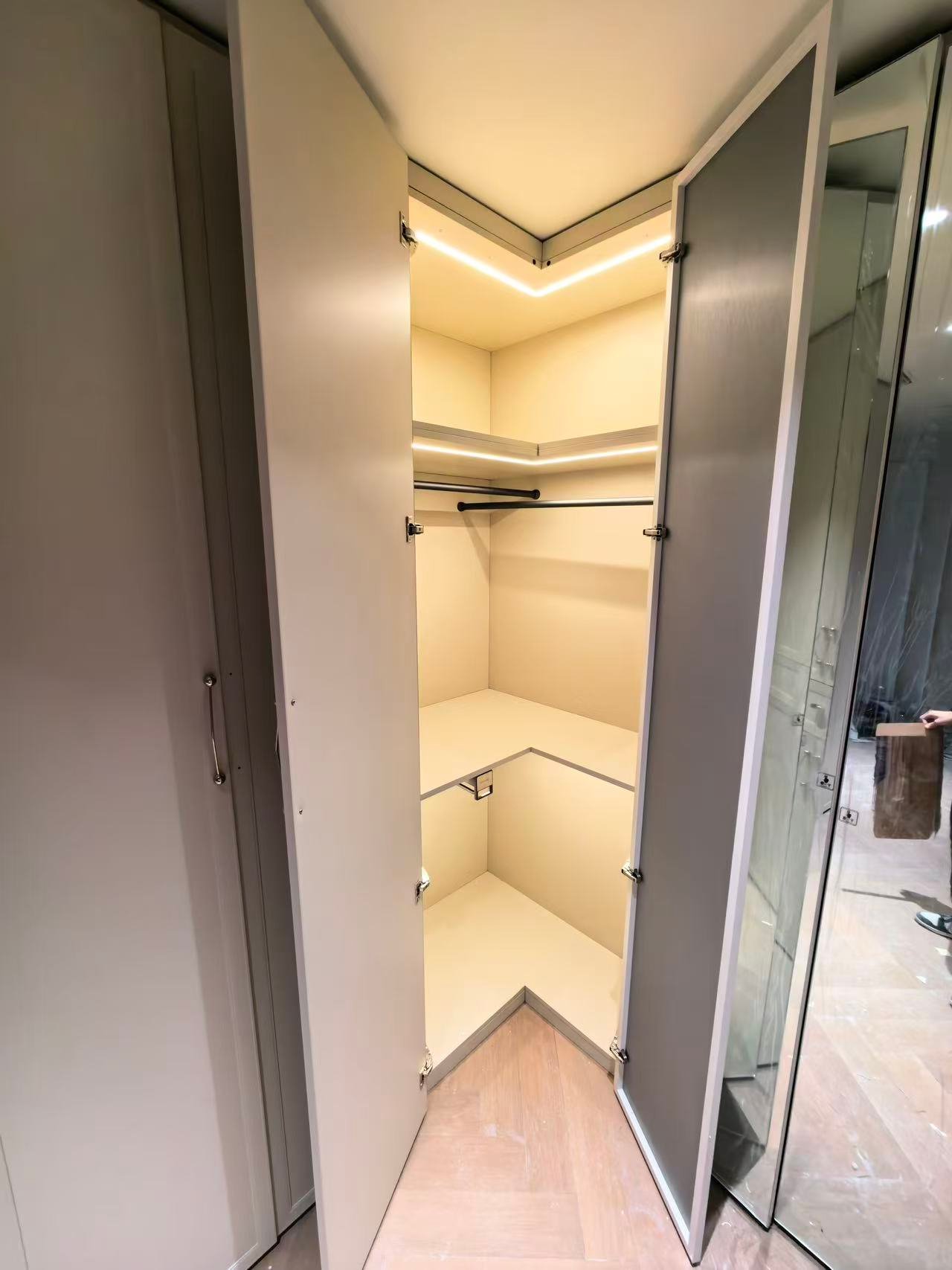 Corner wardrobe with LED light hanging storage