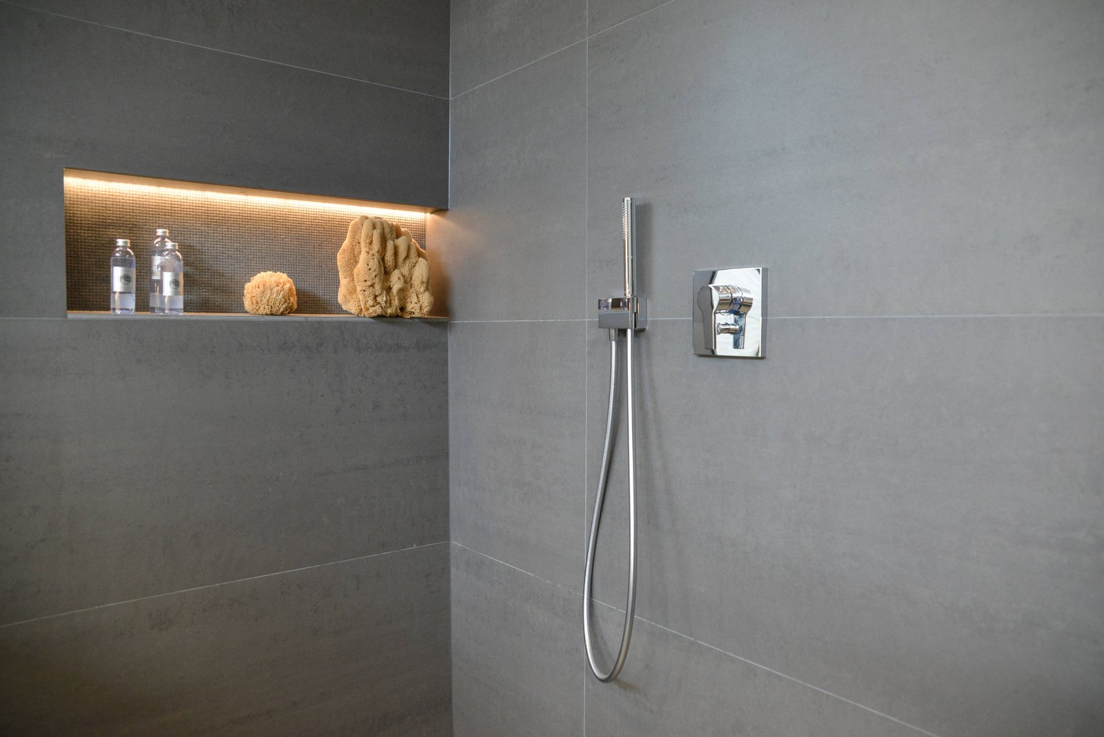 Powder room with compact vanity and framed smart mirror
