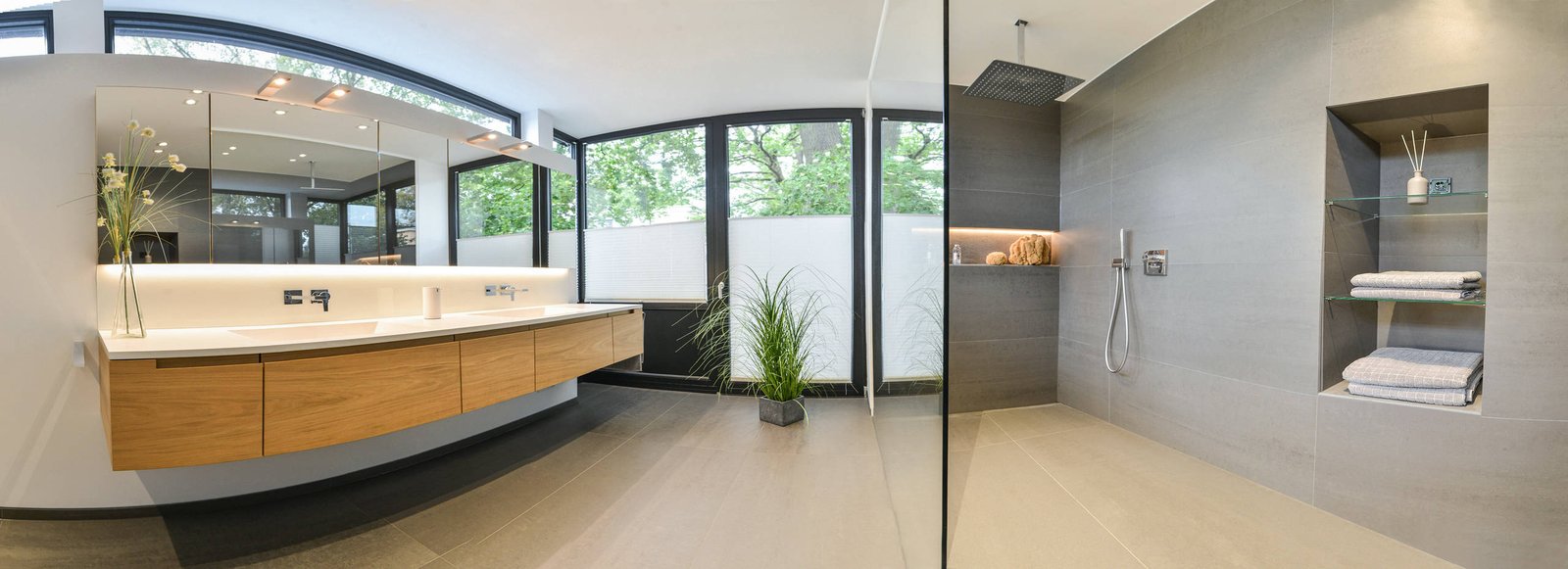 Vanity detail showing handleless fronts and integrated basin