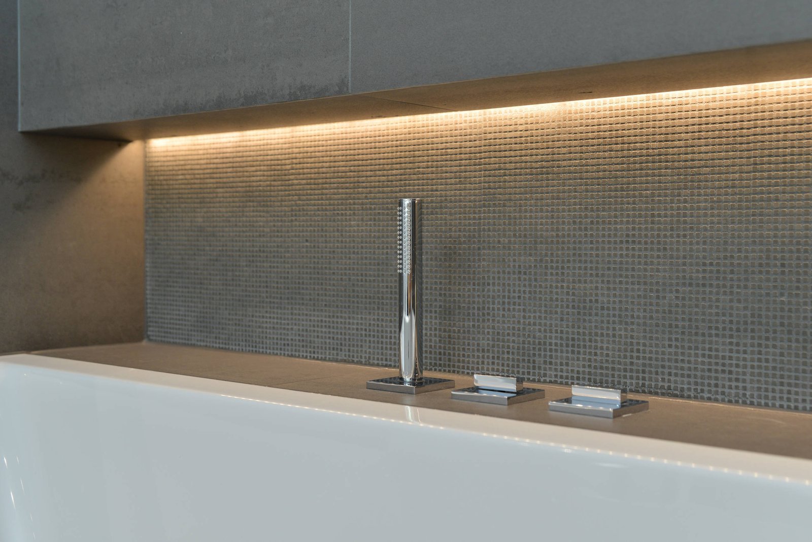 Family bathroom with double vanity and mirror-wall storage